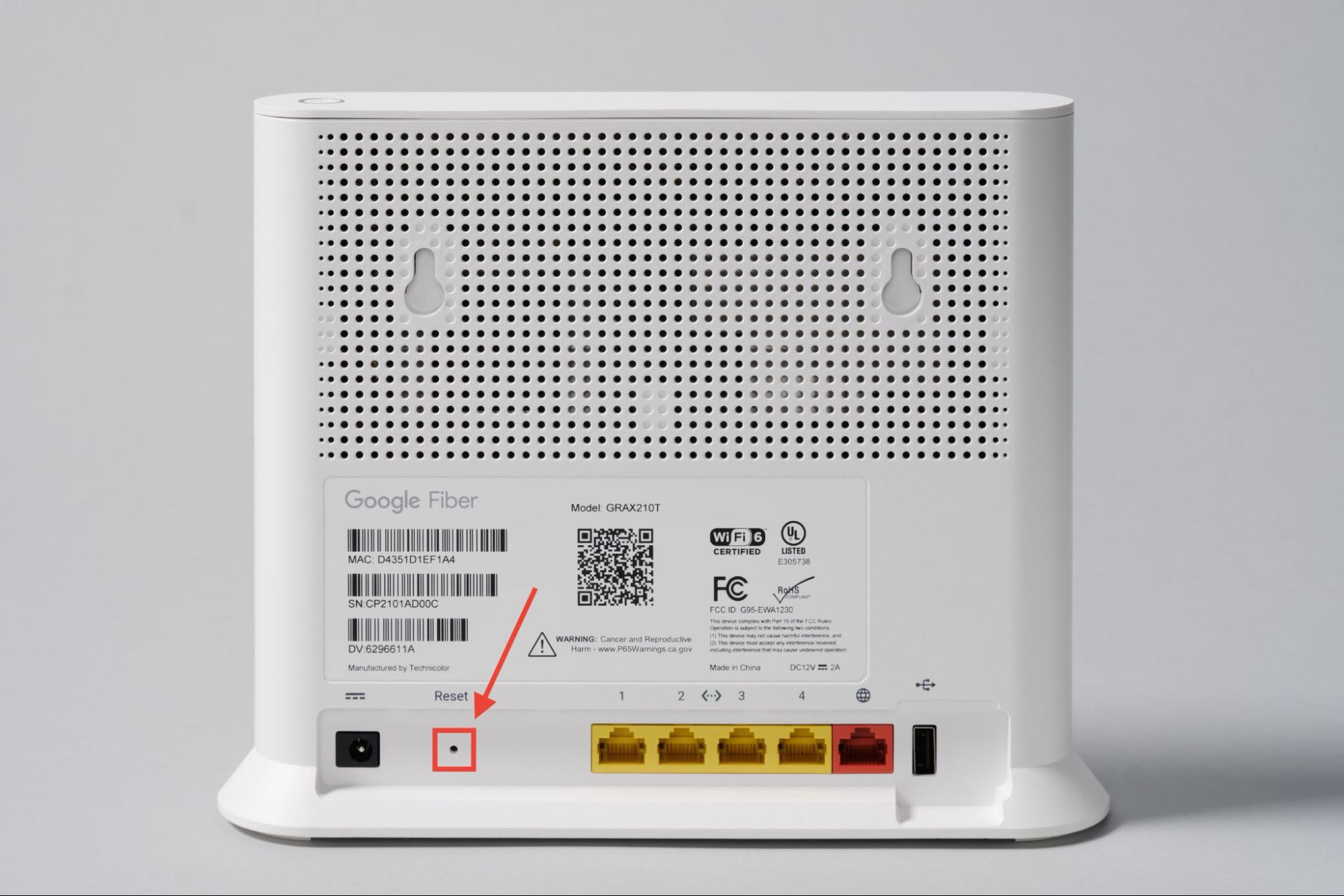 Back of the Wi-Fi 6E Router (Model GR6EXX0C) with reset button highlighted