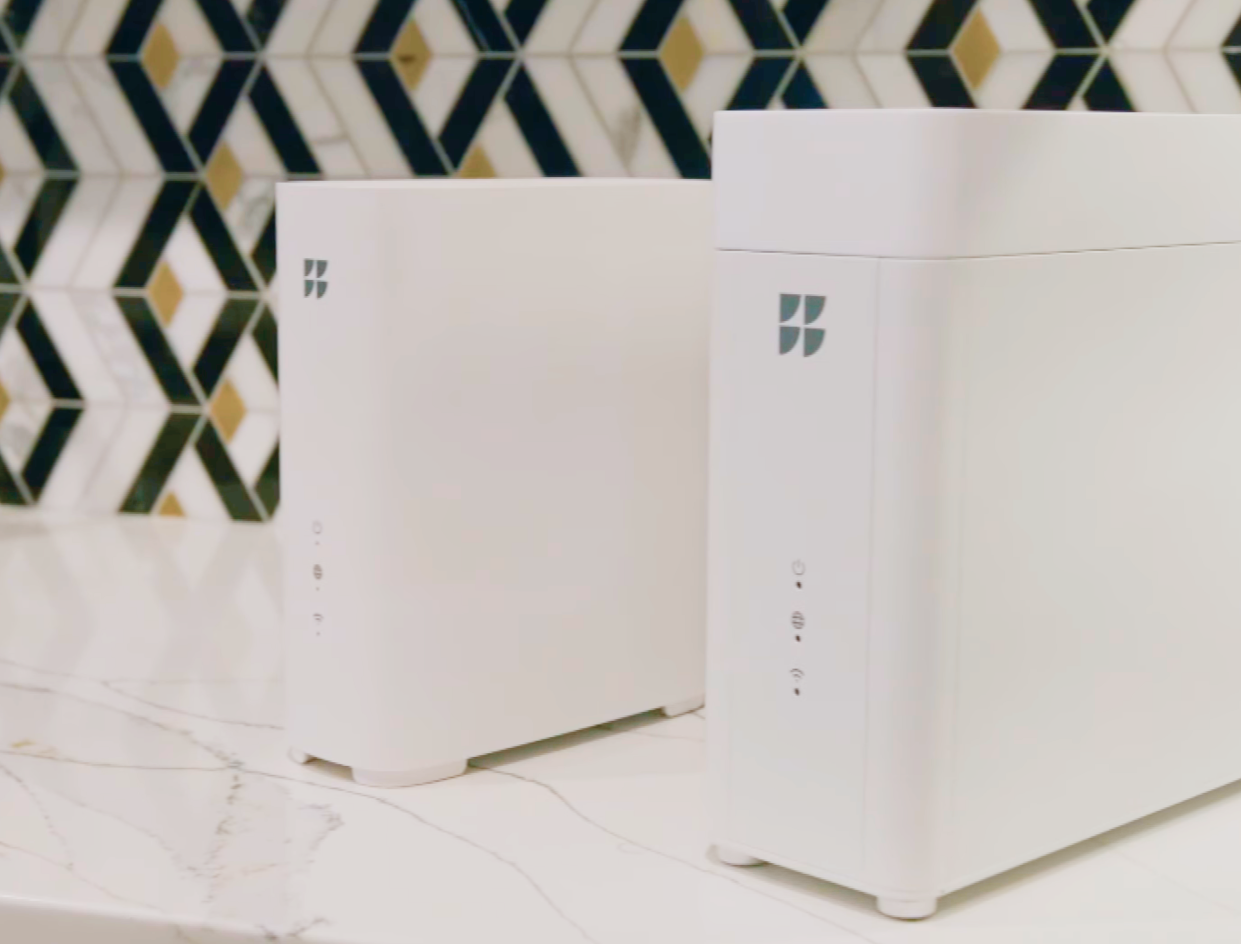 Gfiber Wi-Fi 7 router and mesh extender side to side
